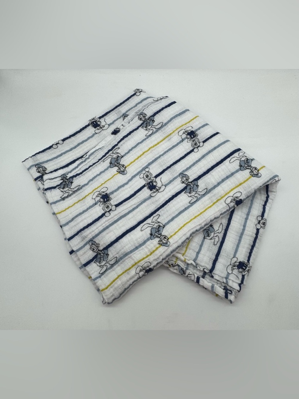 Disney Baby Muslin Swaddle blanket featuring Mickey and Donald Duck